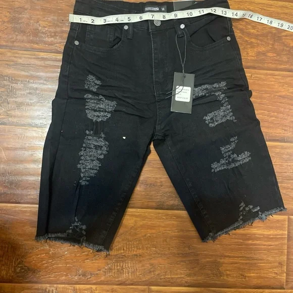 Black Jean Shorts with Heavy Distressing and Frayed Edges - Picture 2 of 4
